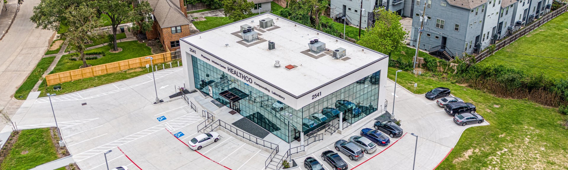 Aerial view of HEALTHCO building showing custom architectural glazing
